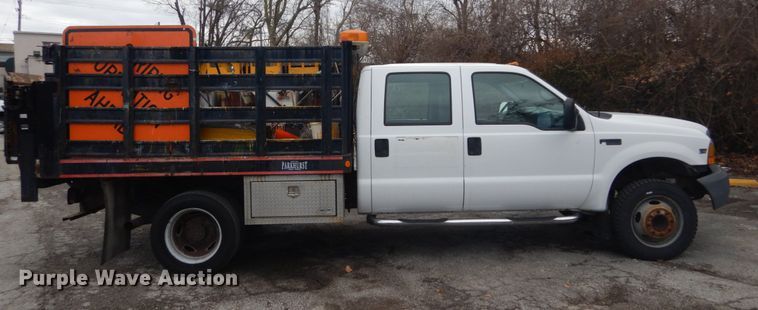 image for item GT9577 1999 Ford F550 Super Duty  Crew Cab flatbed pickup truck