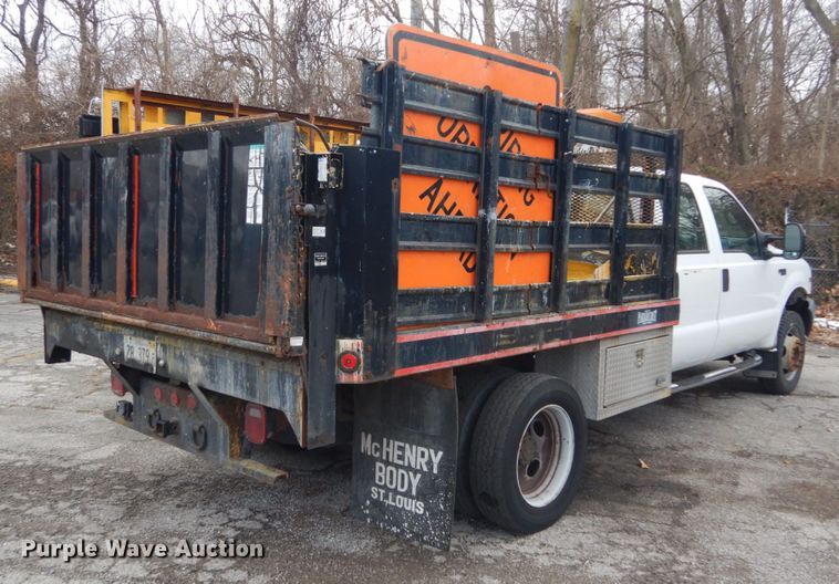 image for item GT9577 1999 Ford F550 Super Duty  Crew Cab flatbed pickup truck