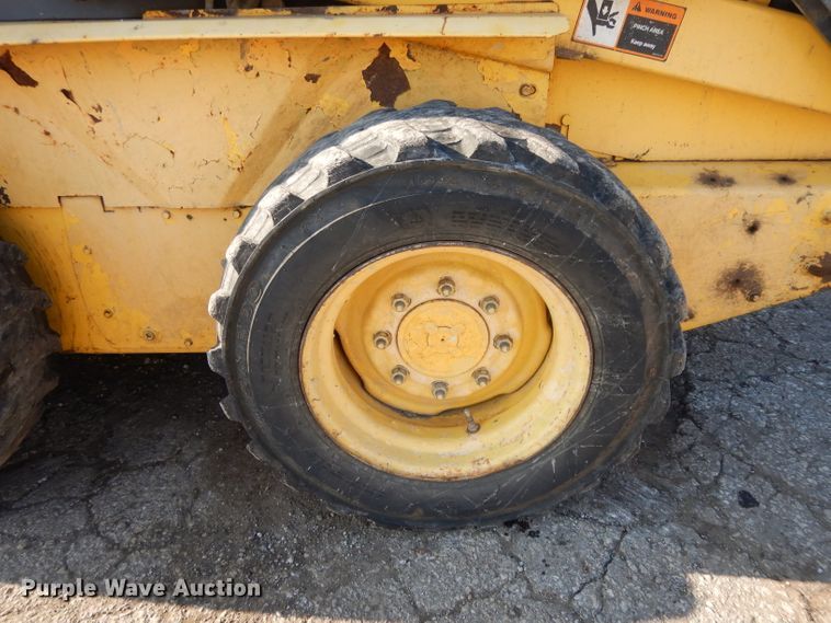 image for item DL2139 1999 New Holland LS170  skid steer loader