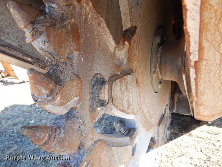 image for item IA9394 2015 Caterpillar SW345B-80 48" skid steer wheel saw