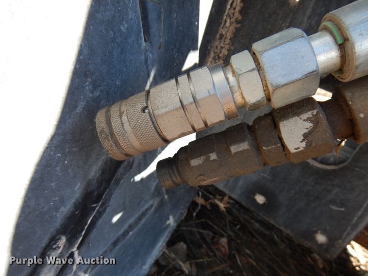 image for item IA9394 2015 Caterpillar SW345B-80 48" skid steer wheel saw