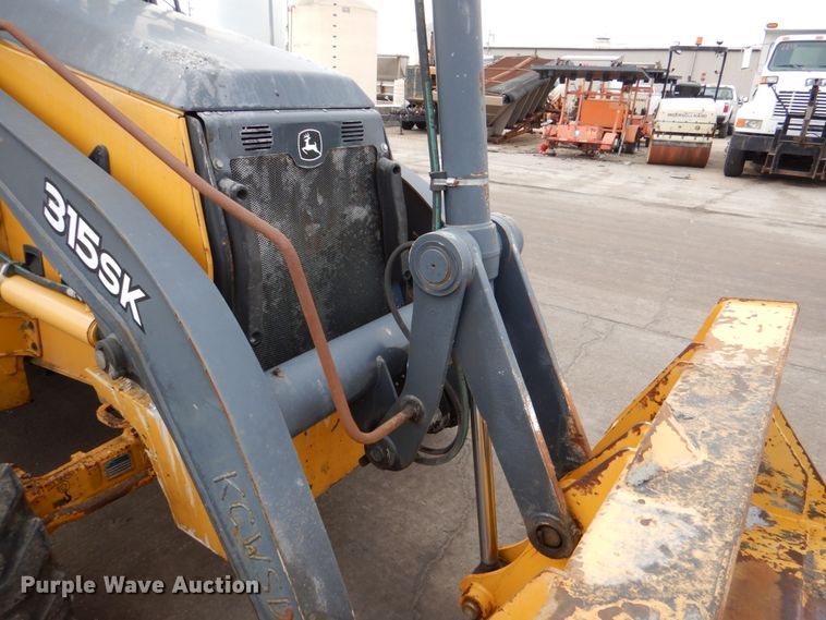 image for item DN6124 2014 John Deere 315SK  backhoe