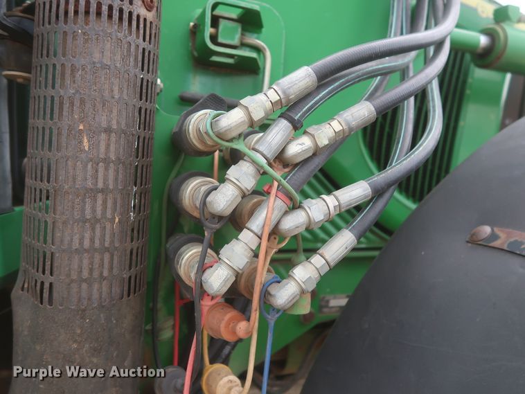 image for item DJ1848 2004 John Deere 6420  MFWD tractor