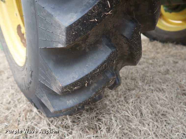 image for item DJ1848 2004 John Deere 6420  MFWD tractor