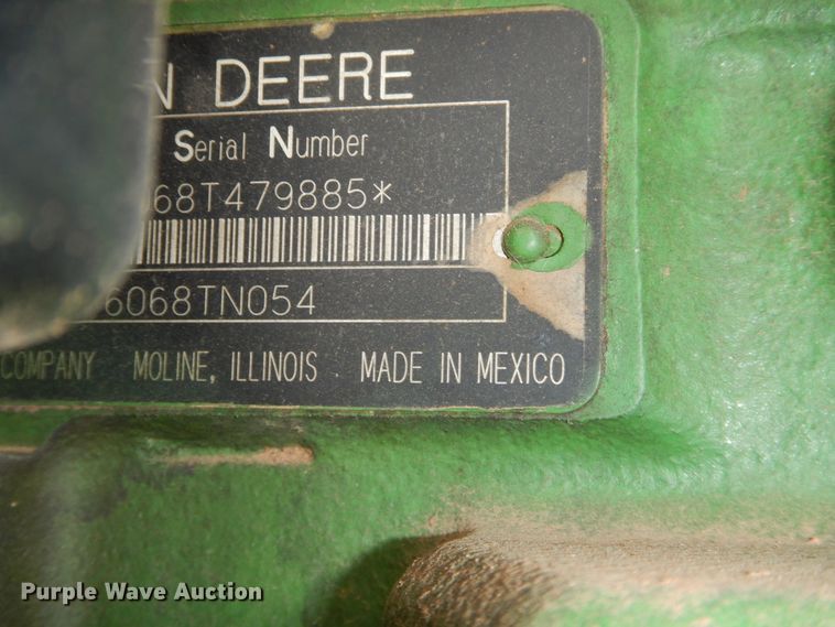 image for item DJ8272 2005 John Deere 7460  cotton stripper