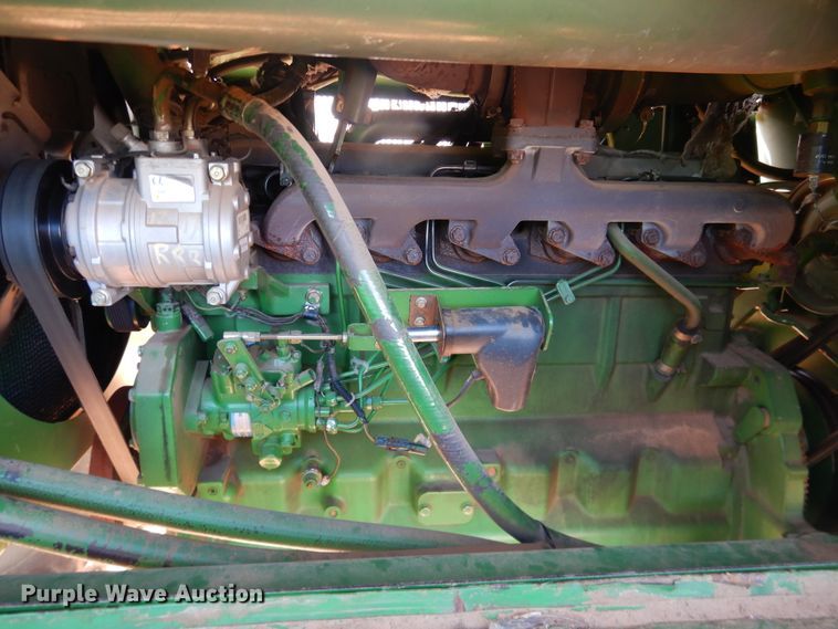 image for item DJ8272 2005 John Deere 7460  cotton stripper