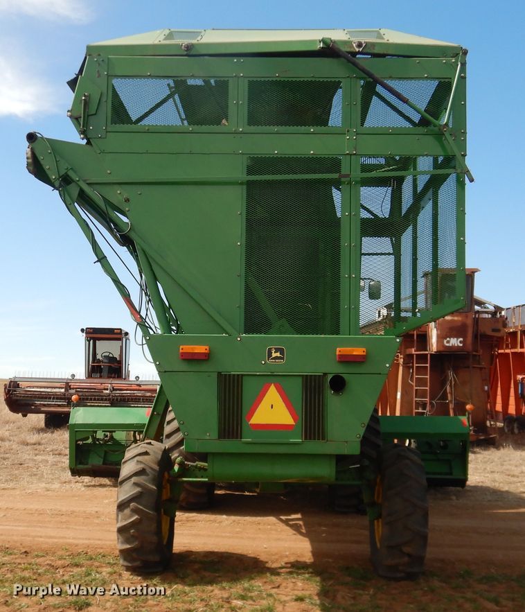 image for item DJ8273 1996 John Deere 7450  cotton stripper