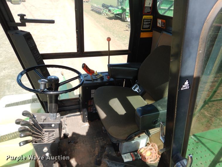 image for item DJ8273 1996 John Deere 7450  cotton stripper