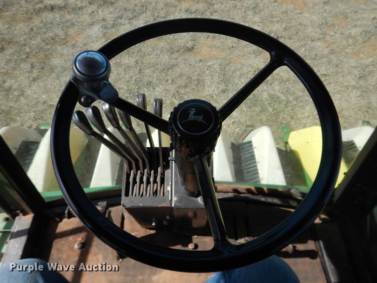 image for item DJ8273 1996 John Deere 7450  cotton stripper