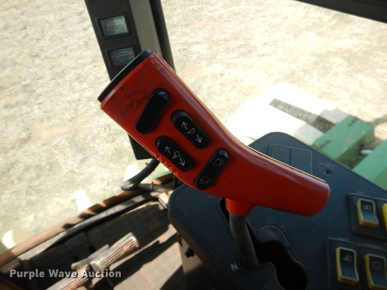 image for item DJ8273 1996 John Deere 7450  cotton stripper