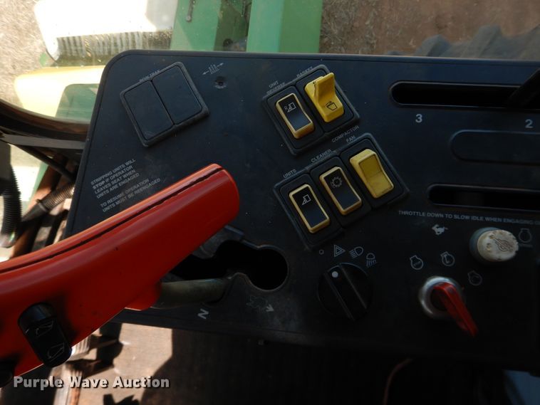 image for item DJ8273 1996 John Deere 7450  cotton stripper