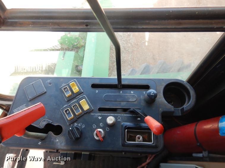 image for item DJ8273 1996 John Deere 7450  cotton stripper