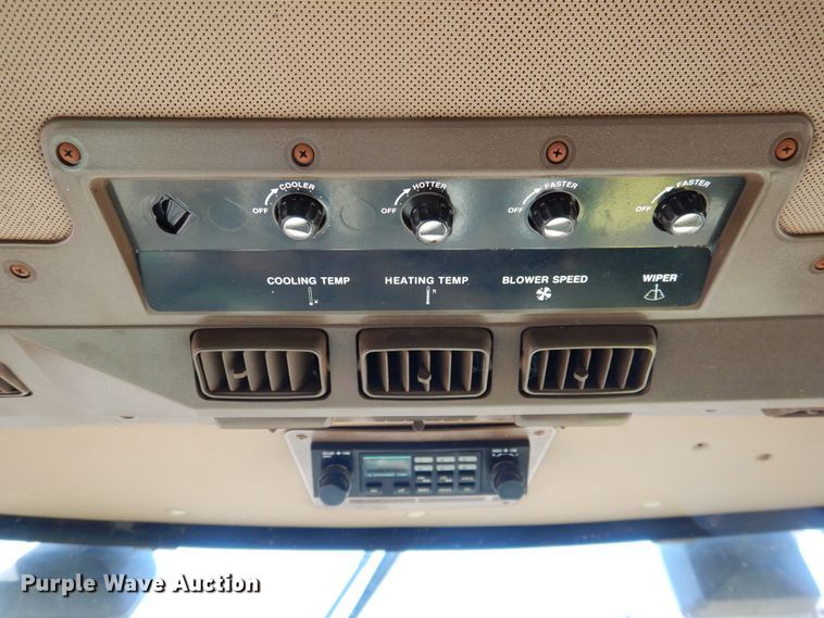 image for item DJ8273 1996 John Deere 7450  cotton stripper