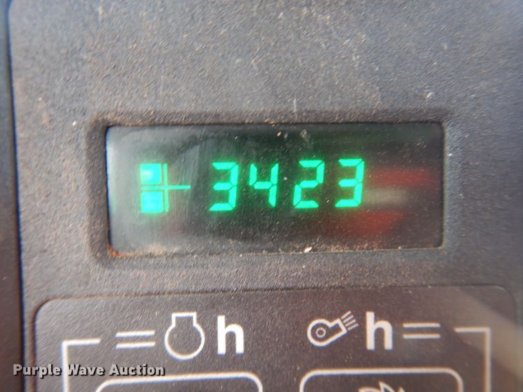 image for item DJ8273 1996 John Deere 7450  cotton stripper