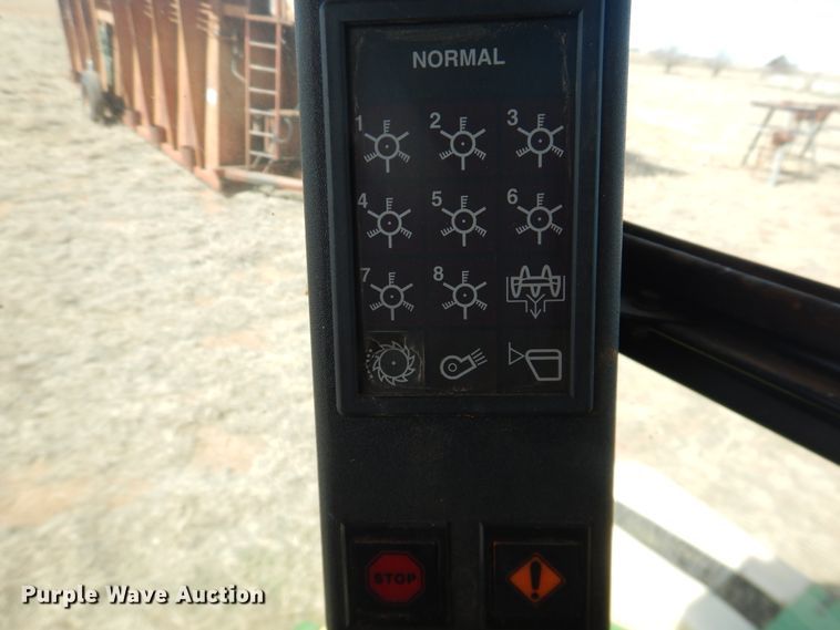 image for item DJ8273 1996 John Deere 7450  cotton stripper