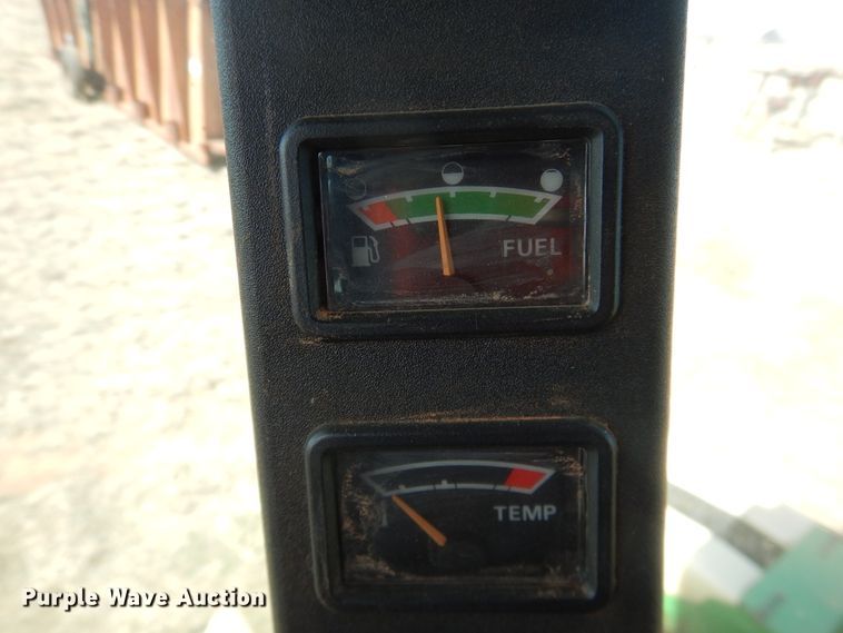 image for item DJ8273 1996 John Deere 7450  cotton stripper