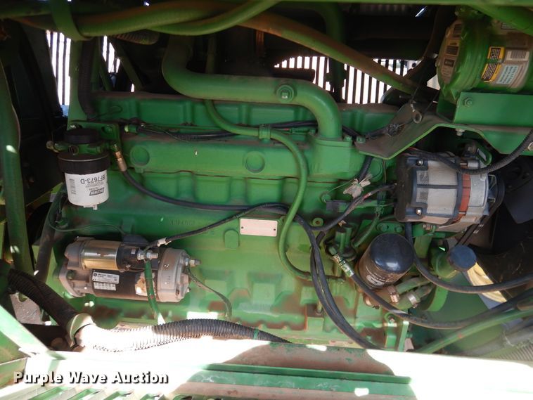 image for item DJ8273 1996 John Deere 7450  cotton stripper