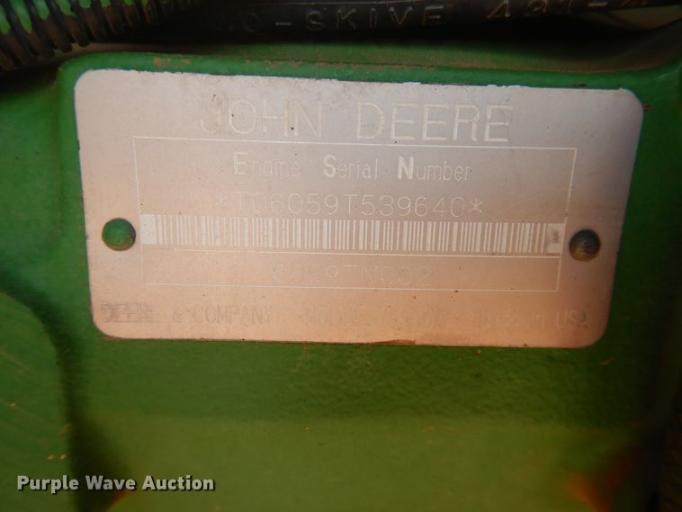 image for item DJ8273 1996 John Deere 7450  cotton stripper