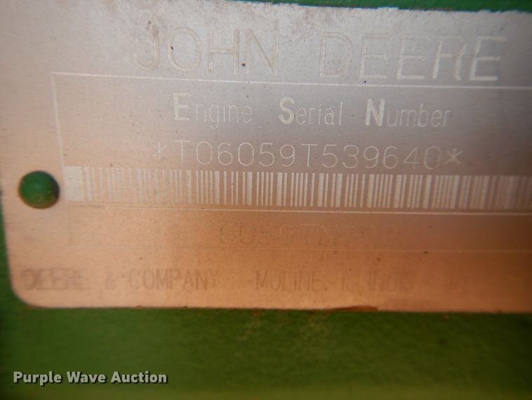 image for item DJ8273 1996 John Deere 7450  cotton stripper