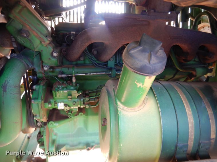 image for item DJ8273 1996 John Deere 7450  cotton stripper