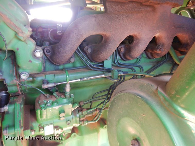 image for item DJ8273 1996 John Deere 7450  cotton stripper