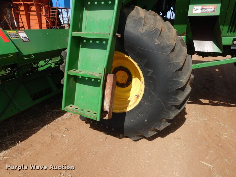 image for item DJ8273 1996 John Deere 7450  cotton stripper