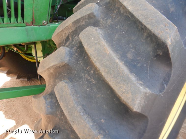 image for item DJ8273 1996 John Deere 7450  cotton stripper