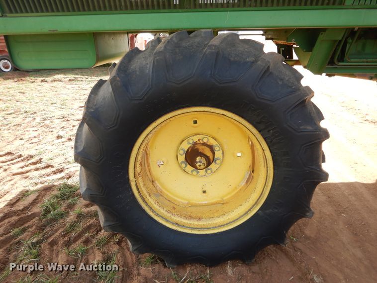 image for item DJ8273 1996 John Deere 7450  cotton stripper