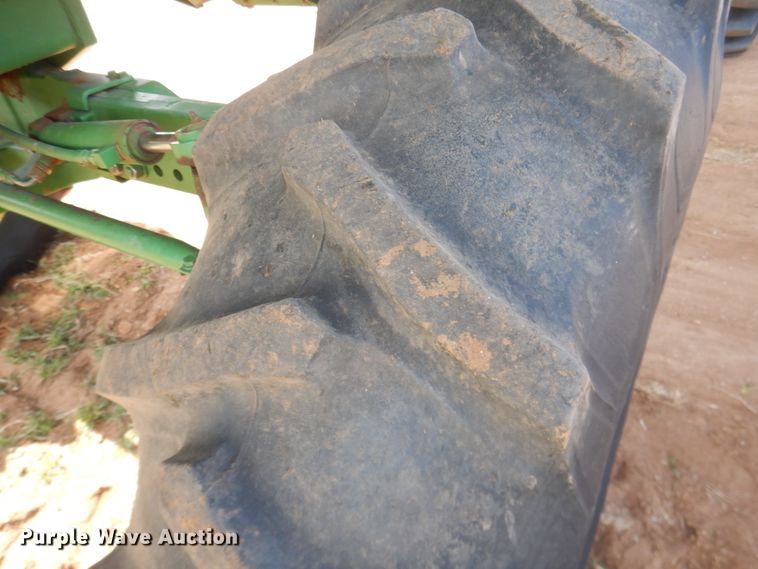 image for item DJ8273 1996 John Deere 7450  cotton stripper