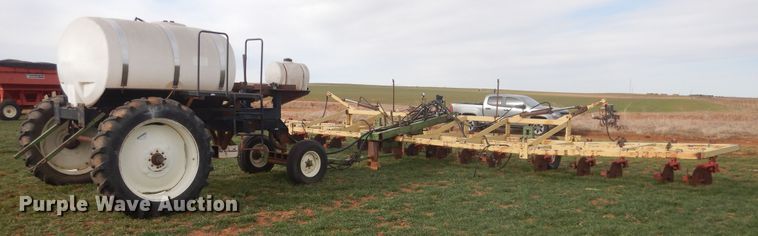 image for item DJ8286 Strip-till unit with nurse tank trailer