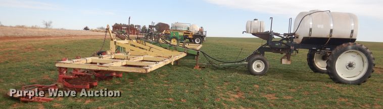 image for item DJ8286 Strip-till unit with nurse tank trailer