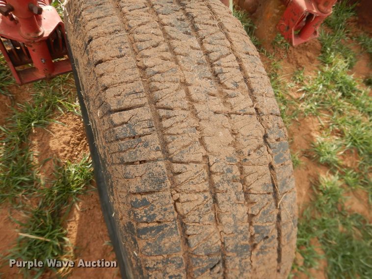 image for item DJ8286 Strip-till unit with nurse tank trailer