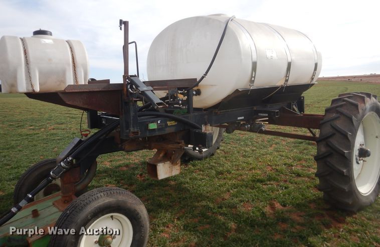image for item DJ8286 Strip-till unit with nurse tank trailer