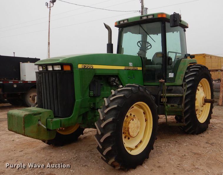 image for item DJ8823 1996 John Deere 8300  MFWD tractor