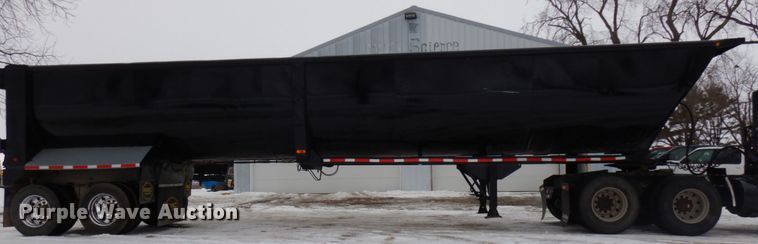 image for item IA9351 2009 MAC SE end dump trailer