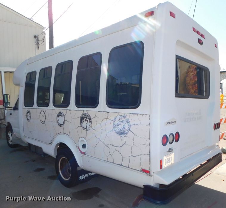 image for item DJ5973 2010 Ford E450 Super Duty  shuttle bus