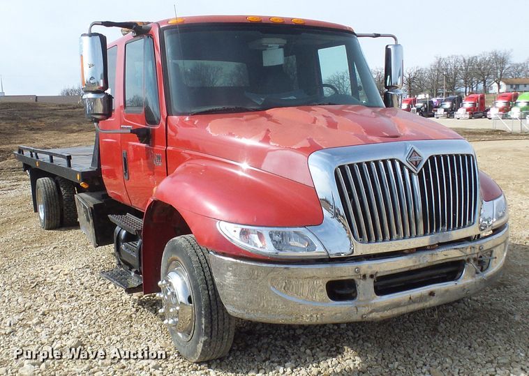 image for item DL0804 2003 International 4300  rollback truck