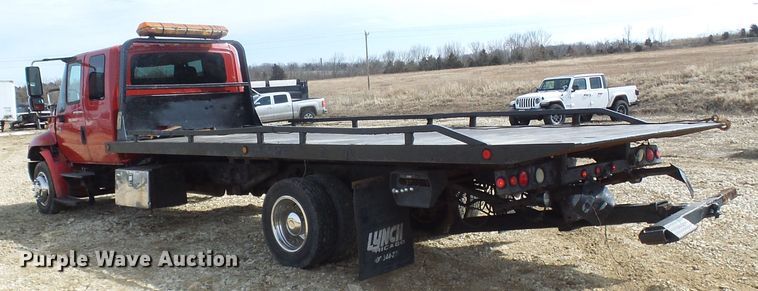 image for item DL0804 2003 International 4300  rollback truck