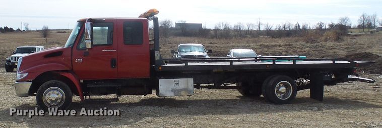 image for item DL0804 2003 International 4300  rollback truck