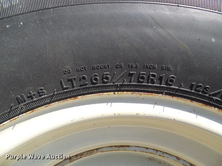 image for item DL0889 (4) Goodyear 265/75R16 tires and skid steer wheels