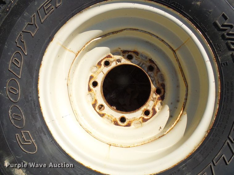 image for item DL0889 (4) Goodyear 265/75R16 tires and skid steer wheels