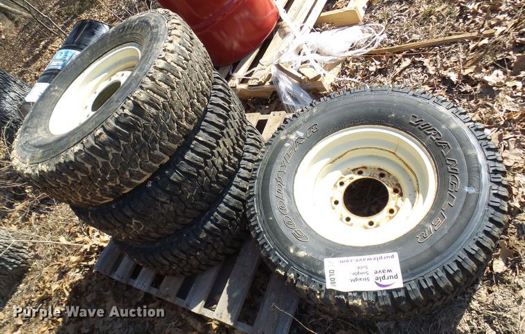 image for item DL0889 (4) Goodyear 265/75R16 tires and skid steer wheels