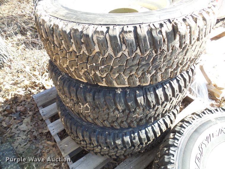 image for item DL0889 (4) Goodyear 265/75R16 tires and skid steer wheels