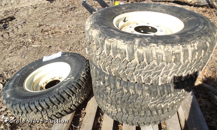 image for item DL0889 (4) Goodyear 265/75R16 tires and skid steer wheels