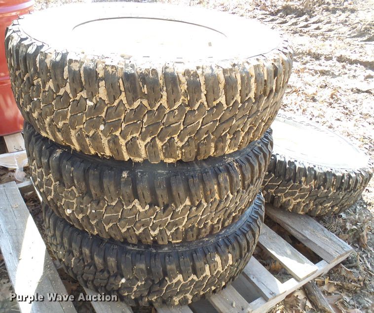 image for item DL0889 (4) Goodyear 265/75R16 tires and skid steer wheels