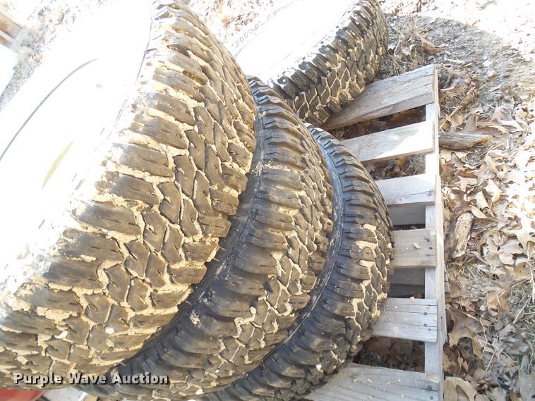 image for item DL0889 (4) Goodyear 265/75R16 tires and skid steer wheels