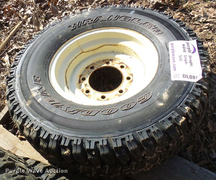 image for item DL0889 (4) Goodyear 265/75R16 tires and skid steer wheels
