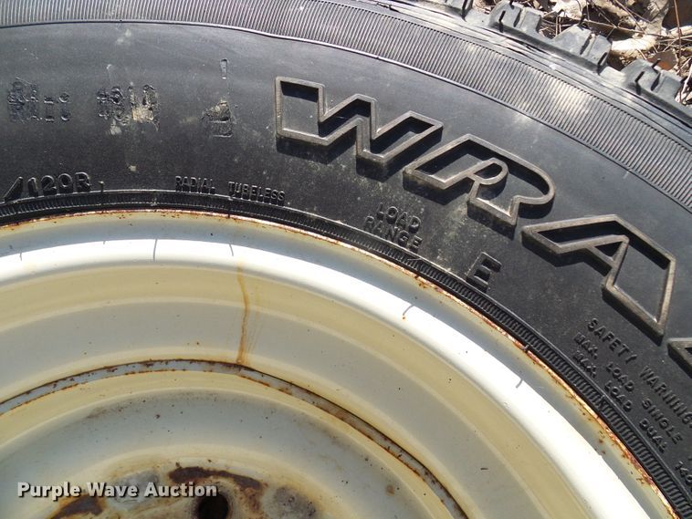 image for item DL0889 (4) Goodyear 265/75R16 tires and skid steer wheels