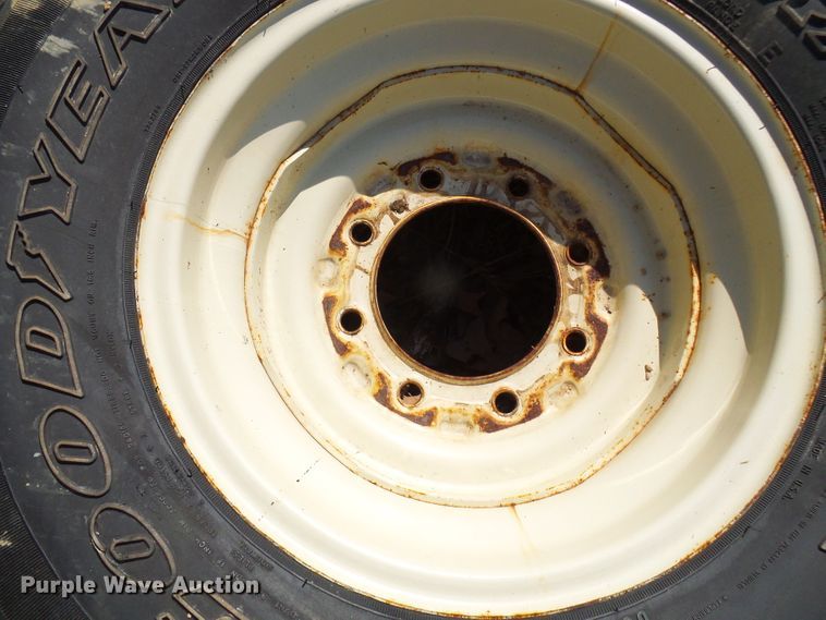 image for item DL0889 (4) Goodyear 265/75R16 tires and skid steer wheels