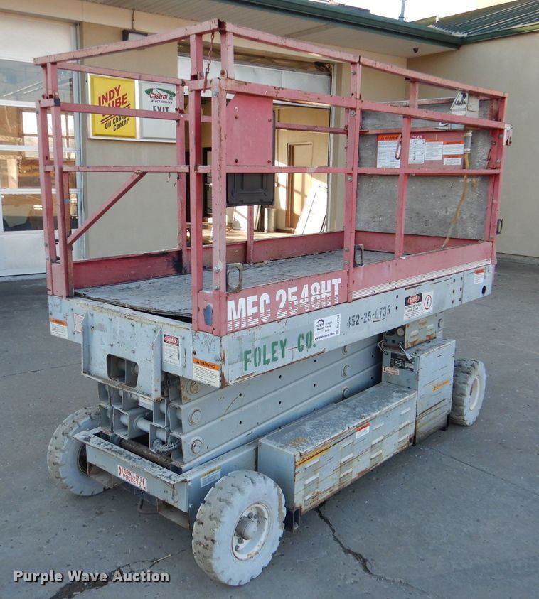 image for item DL2208 1999 Mec 2548HT  scissor lift